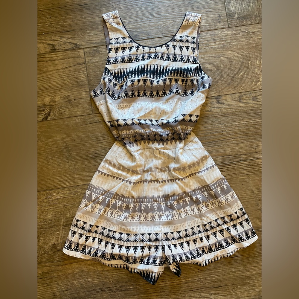 BCBG romper with open back